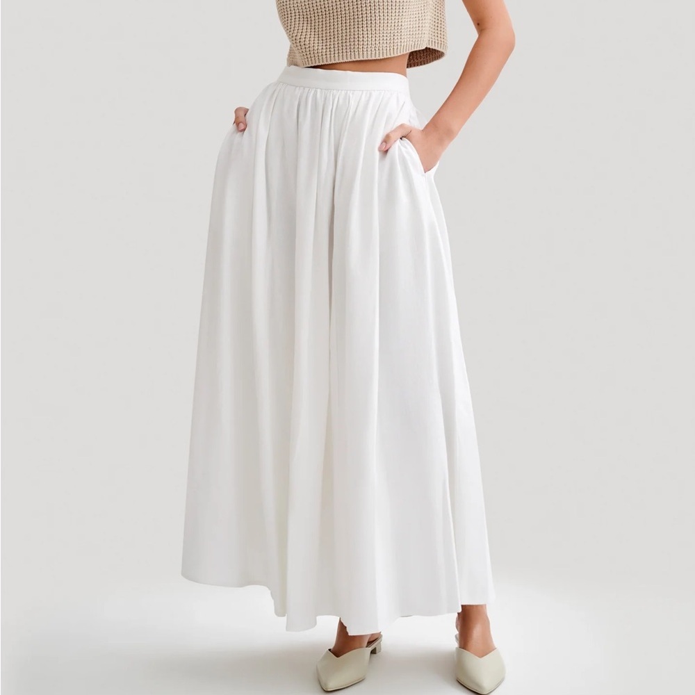 Meshki White Flowing Maxi Skirt with Side Pockets